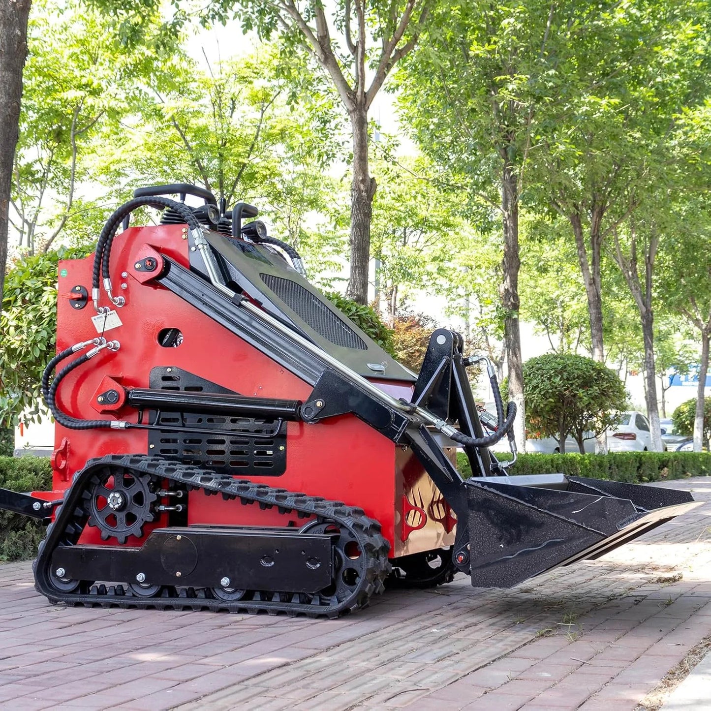 محمل انزلاقي صغير مع دلو مقاس 46 بوصة، آلة انزلاقية زاحفة متعددة الوظائف بقوة 23 حصانًا، محمل انزلاقي صغير يعمل بالدفع الهيدروليكي 